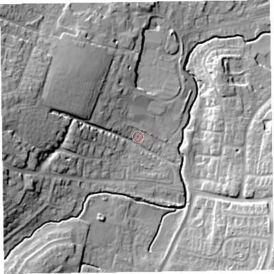 Shaded relief map of the ground around TA15DD, computed from Environment Agency LiDAR. The ground here sits at about 21 m above sea level and falls 18 m across the surrounding 800 m. Surface water reaching this point runs off ground lying to the west, 14.8 m higher.