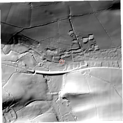 Shaded relief map of the ground around TA229AP, computed from Environment Agency LiDAR. The ground here sits at about 128 m above sea level and falls 88 m across the surrounding 800 m. Surface water reaching this point runs off ground lying to the north, 77.4 m higher.