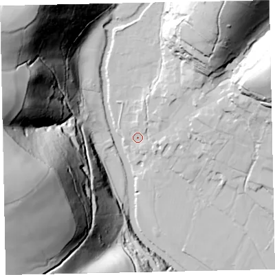Shaded relief map of the ground around TA229HJ, computed from Environment Agency LiDAR. The ground here sits at about 135 m above sea level and falls 120 m across the surrounding 800 m. Surface water reaching this point runs off ground lying to the north-east, 68.6 m higher.