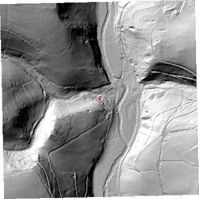 Shaded relief map of the ground around TA229JN, computed from Environment Agency LiDAR. The ground here sits at about 181 m above sea level and falls 132 m across the surrounding 800 m. Surface water reaching this point runs off ground lying to the south-west, 124.0 m higher.