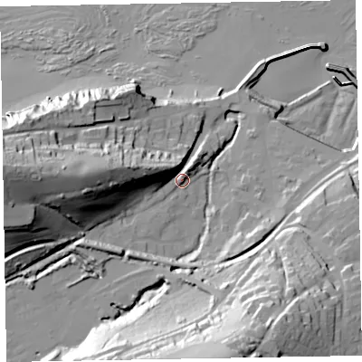 Shaded relief map of the ground around TA230BE, computed from Environment Agency LiDAR. The ground here sits at about 13 m above sea level and falls 59 m across the surrounding 800 m. Surface water reaching this point runs off ground lying to the west, 35.6 m higher.