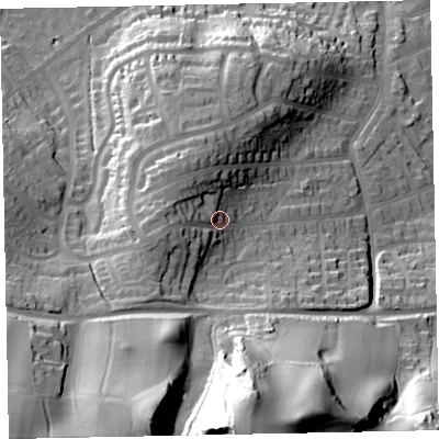 Shaded relief map of the ground around TA245EY, computed from Environment Agency LiDAR. The ground here sits at about 52 m above sea level and falls 80 m across the surrounding 800 m. Surface water reaching this point runs off ground lying to the west, 10.6 m higher.