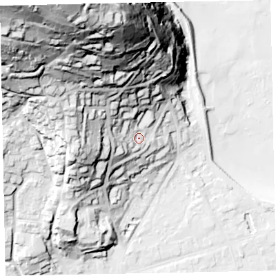 Shaded relief map of the ground around TA245QH, computed from Environment Agency LiDAR. The ground here sits at about 25 m above sea level and falls 142 m across the surrounding 800 m. Surface water reaching this point runs off ground lying to the north-west, 113.4 m higher.