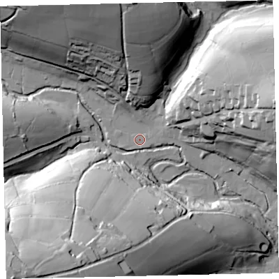 Shaded relief map of the ground around TA247PY, computed from Environment Agency LiDAR. The ground here sits at about 254 m above sea level and falls 69 m across the surrounding 800 m. Surface water reaching this point runs off ground lying to the north-north-west, 47.1 m higher.