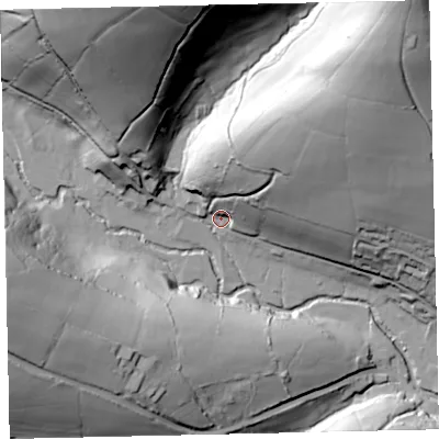 Shaded relief map of the ground around TA247QG, computed from Environment Agency LiDAR. The ground here sits at about 261 m above sea level and falls 76 m across the surrounding 800 m. Surface water reaching this point runs off ground lying to the north-east, 55.0 m higher.