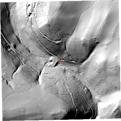 Shaded relief map of the ground around TA247UG, computed from Environment Agency LiDAR. The ground here sits at about 131 m above sea level and falls 153 m across the surrounding 800 m. Surface water reaching this point runs off ground lying to the south-west, 134.4 m higher.