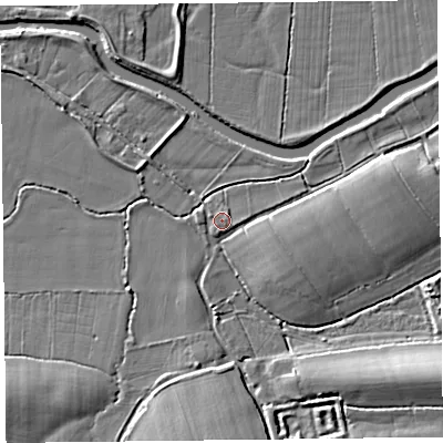 Shaded relief map of the ground around TA35NX, computed from Environment Agency LiDAR. The ground here sits at about 9 m above sea level and falls 9 m across the surrounding 800 m. Surface water reaching this point runs off ground lying to the south, 7.1 m higher.