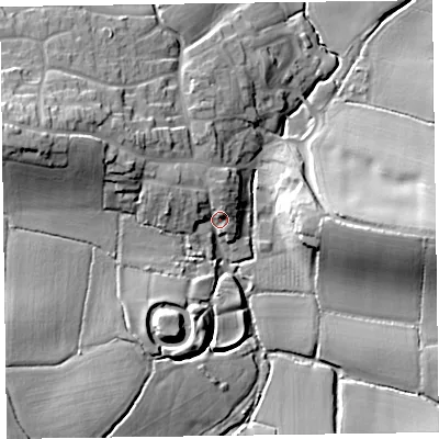 Shaded relief map of the ground around TA51TG, computed from Environment Agency LiDAR. The ground here sits at about 33 m above sea level and falls 21 m across the surrounding 800 m. Surface water reaching this point runs off ground lying to the north-west, 6.2 m higher.