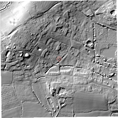 Shaded relief map of the ground around TA52FT, computed from Environment Agency LiDAR. The ground here sits at about 9 m above sea level and falls 16 m across the surrounding 800 m. Surface water reaching this point runs off ground lying to the north-west, 11.6 m higher.