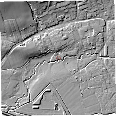 Shaded relief map of the ground around TA52JA, computed from Environment Agency LiDAR. The ground here sits at about 13 m above sea level and falls 22 m across the surrounding 800 m. Surface water reaching this point runs off ground lying to the west-north-west, 9.4 m higher.