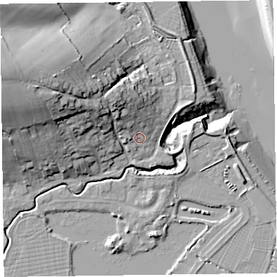 Shaded relief map of the ground around TA52QU, computed from Environment Agency LiDAR. The ground here sits at about 9 m above sea level and falls 32 m across the surrounding 800 m. Surface water reaching this point runs off ground lying to the north-west, 10.2 m higher.