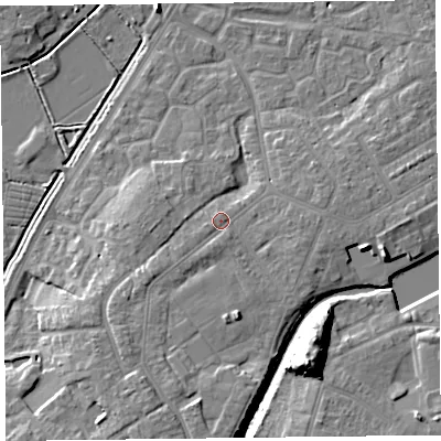 Shaded relief map of the ground around TA63QE, computed from Environment Agency LiDAR. The ground here sits at about 9 m above sea level and falls 15 m across the surrounding 800 m. Surface water reaching this point runs off ground lying to the south, 4.4 m higher.
