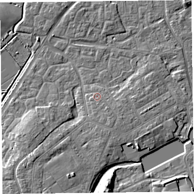 Shaded relief map of the ground around TA63QN, computed from Environment Agency LiDAR. The ground here sits at about 9 m above sea level and falls 13 m across the surrounding 800 m. Surface water reaching this point runs off ground lying to the south-east, 2.0 m higher.