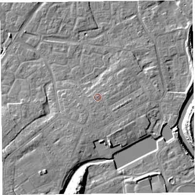 Shaded relief map of the ground around TA63QW, computed from Environment Agency LiDAR. The ground here sits at about 9 m above sea level and falls 18 m across the surrounding 800 m. Surface water reaching this point runs off ground lying to the south, 1.5 m higher.