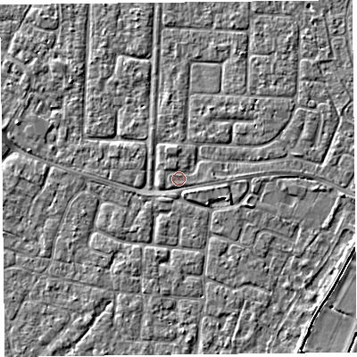 Shaded relief map of the ground around TA64DX, computed from Environment Agency LiDAR. The ground here sits at about 6 m above sea level and falls 3 m across the surrounding 800 m. Surface water reaching this point runs off ground lying to the east, 0.6 m higher.