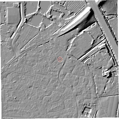 Shaded relief map of the ground around TA64EX, computed from Environment Agency LiDAR. The ground here sits at about 6 m above sea level and falls 11 m across the surrounding 800 m. Surface water reaching this point runs off ground lying to the north, 2.9 m higher.