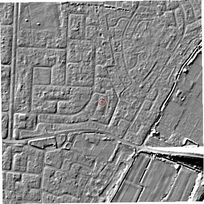 Shaded relief map of the ground around TA64JX, computed from Environment Agency LiDAR. The ground here sits at about 6 m above sea level and falls 9 m across the surrounding 800 m. Surface water reaching this point runs off ground lying to the west, 1.3 m higher.