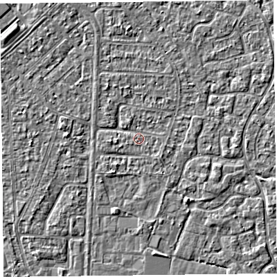Shaded relief map of the ground around TA64QJ, computed from Environment Agency LiDAR. The ground here sits at about 6 m above sea level and falls 3 m across the surrounding 800 m. Surface water reaching this point runs off ground lying to the north, 1.8 m higher.