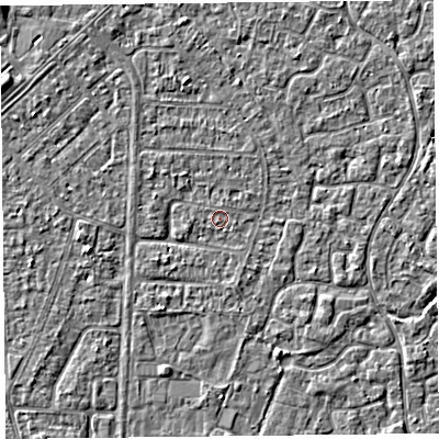 Shaded relief map of the ground around TA64QN, computed from Environment Agency LiDAR. The ground here sits at about 6 m above sea level and falls 3 m across the surrounding 800 m. Surface water reaching this point runs off ground lying to the north-north-west, 1.8 m higher.
