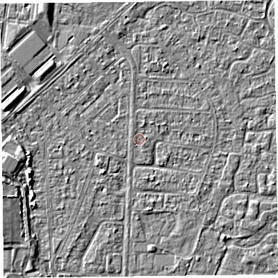Shaded relief map of the ground around TA64QT, computed from Environment Agency LiDAR. The ground here sits at about 6 m above sea level and falls 5 m across the surrounding 800 m. Surface water reaching this point runs off ground lying to the north-north-east, 0.9 m higher.