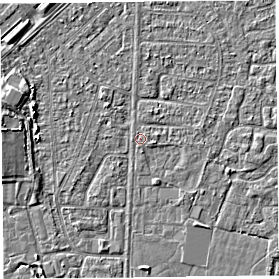 Shaded relief map of the ground around TA64QX, computed from Environment Agency LiDAR. The ground here sits at about 6 m above sea level and falls 5 m across the surrounding 800 m. Surface water reaching this point runs off ground lying to the west-north-west, 4.2 m higher.