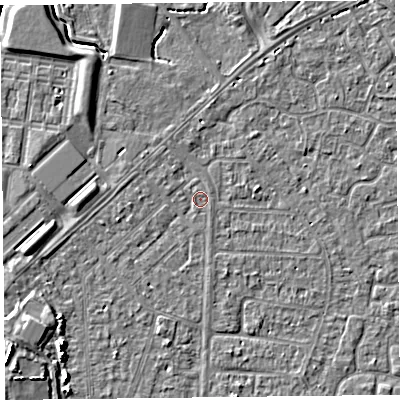 Shaded relief map of the ground around TA64RG, computed from Environment Agency LiDAR. The ground here sits at about 6 m above sea level and falls 5 m across the surrounding 800 m. Surface water reaching this point runs off ground lying to the north-west, 0.7 m higher.