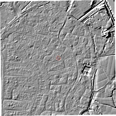 Shaded relief map of the ground around TA64UH, computed from Environment Agency LiDAR. The ground here sits at about 6 m above sea level and falls 8 m across the surrounding 800 m. Surface water reaching this point runs off ground lying to the west-south-west, 0.7 m higher.