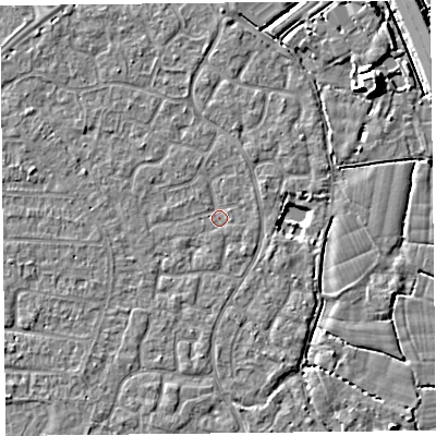 Shaded relief map of the ground around TA64UJ, computed from Environment Agency LiDAR. The ground here sits at about 6 m above sea level and falls 7 m across the surrounding 800 m. Surface water reaching this point runs off ground lying to the north, 1.1 m higher.