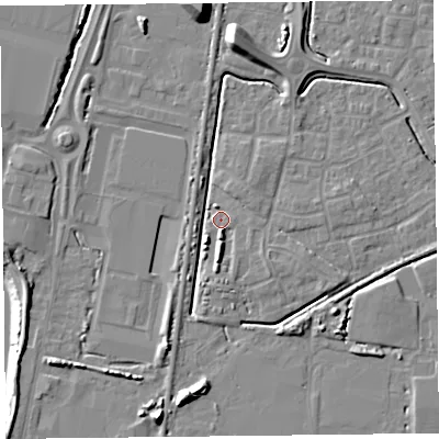 Shaded relief map of the ground around TA64YX, computed from Environment Agency LiDAR. The ground here sits at about 6 m above sea level and falls 13 m across the surrounding 800 m. Surface water reaching this point runs off ground lying to the north, 7.6 m higher.