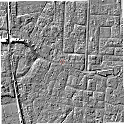 Shaded relief map of the ground around TA65BJ, computed from Environment Agency LiDAR. The ground here sits at about 6 m above sea level and falls 7 m across the surrounding 800 m. The ground contributing surface water to this point lies to the east-north-east.
