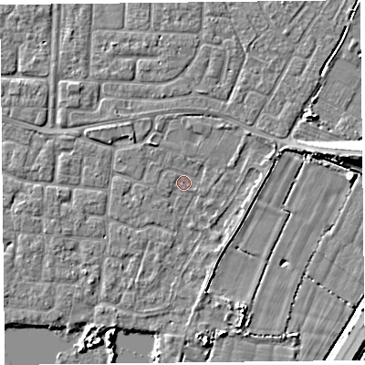 Shaded relief map of the ground around TA65DG, computed from Environment Agency LiDAR. The ground here sits at about 6 m above sea level and falls 7 m across the surrounding 800 m. Surface water reaching this point runs off ground lying to the north-west, 1.9 m higher.