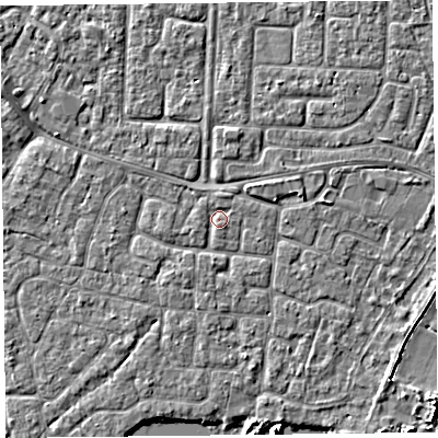 Shaded relief map of the ground around TA65DR, computed from Environment Agency LiDAR. The ground here sits at about 6 m above sea level and falls 4 m across the surrounding 800 m. Surface water reaching this point runs off ground lying to the north, 1.4 m higher.