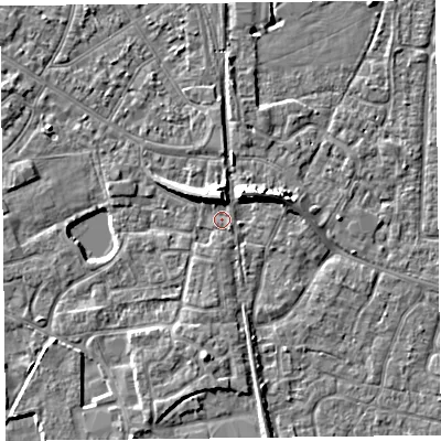 Shaded relief map of the ground around TA65FR, computed from Environment Agency LiDAR. The ground here sits at about 7 m above sea level and falls 7 m across the surrounding 800 m. Surface water reaching this point runs off ground lying to the north, 5.1 m higher.