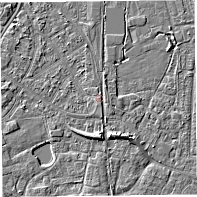 Shaded relief map of the ground around TA65HB, computed from Environment Agency LiDAR. The ground here sits at about 7 m above sea level and falls 7 m across the surrounding 800 m. Surface water reaching this point runs off ground lying to the south, 5.6 m higher.