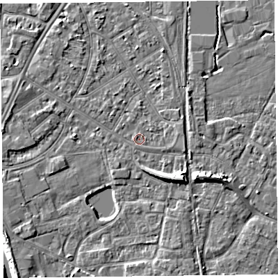 Shaded relief map of the ground around TA65JA, computed from Environment Agency LiDAR. The ground here sits at about 7 m above sea level and falls 9 m across the surrounding 800 m. Surface water reaching this point runs off ground lying to the east, 1.2 m higher.