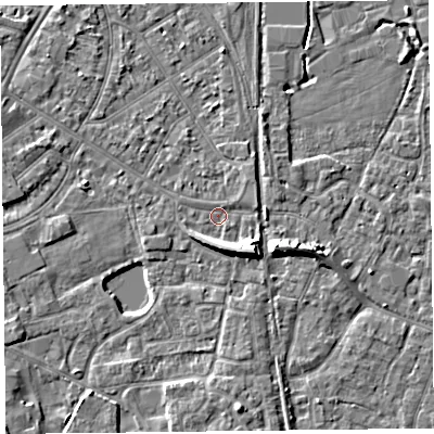 Shaded relief map of the ground around TA65JE, computed from Environment Agency LiDAR. The ground here sits at about 6 m above sea level and falls 7 m across the surrounding 800 m. Surface water reaching this point runs off ground lying to the south-east, 5.1 m higher.