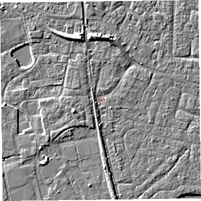 Shaded relief map of the ground around TA65SY, computed from Environment Agency LiDAR. The ground here sits at about 6 m above sea level and falls 7 m across the surrounding 800 m. Surface water reaching this point runs off ground lying to the north, 5.4 m higher.