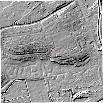 Shaded relief map of the ground around TA66DT, computed from Environment Agency LiDAR. The ground here sits at about 11 m above sea level and falls 13 m across the surrounding 800 m. Surface water reaching this point runs off ground lying to the north-west, 4.3 m higher.