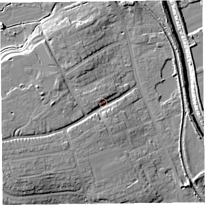 Shaded relief map of the ground around TA66HU, computed from Environment Agency LiDAR. The ground here sits at about 11 m above sea level and falls 13 m across the surrounding 800 m. Surface water reaching this point runs off ground lying to the west, 7.5 m higher.
