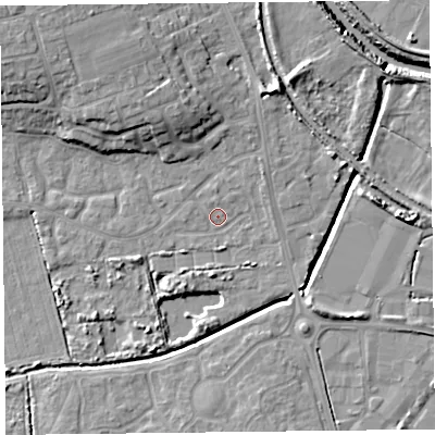 Shaded relief map of the ground around TA66UE, computed from Environment Agency LiDAR. The ground here sits at about 6 m above sea level and falls 12 m across the surrounding 800 m. Surface water reaching this point runs off ground lying to the north-west, 6.9 m higher.