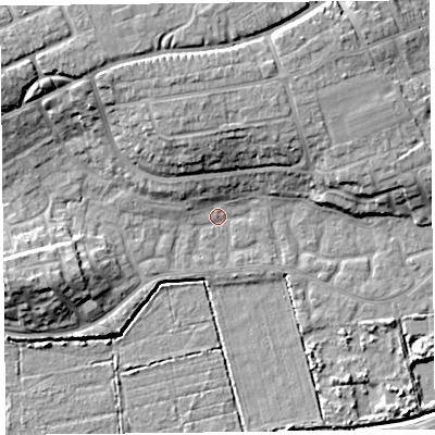 Shaded relief map of the ground around TA66UX, computed from Environment Agency LiDAR. The ground here sits at about 5 m above sea level and falls 13 m across the surrounding 800 m. Surface water reaching this point runs off ground lying to the north-west, 11.5 m higher.
