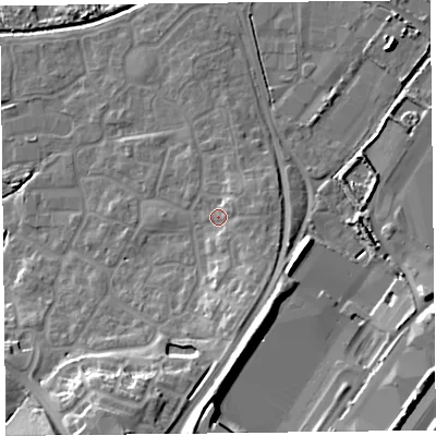 Shaded relief map of the ground around TA66XF, computed from Environment Agency LiDAR. The ground here sits at about 9 m above sea level and falls 18 m across the surrounding 800 m. Surface water reaching this point runs off ground lying to the south-south-east, 5.7 m higher.