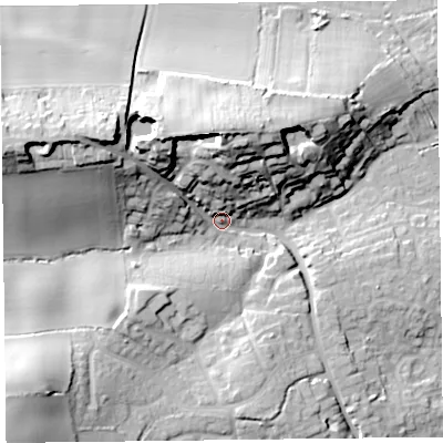 Shaded relief map of the ground around TA67PX, computed from Environment Agency LiDAR. The ground here sits at about 11 m above sea level and falls 31 m across the surrounding 800 m. Surface water reaching this point runs off ground lying to the west-north-west, 26.7 m higher.