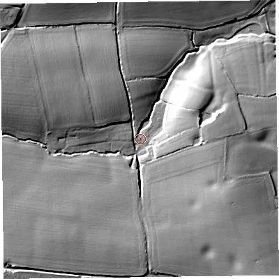 Shaded relief map of the ground around TA70DD, computed from Environment Agency LiDAR. The ground here sits at about 25 m above sea level and falls 22 m across the surrounding 800 m. Surface water reaching this point runs off ground lying to the west-north-west, 15.2 m higher.