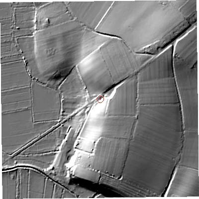 Shaded relief map of the ground around TA70JG, computed from Environment Agency LiDAR. The ground here sits at about 12 m above sea level and falls 23 m across the surrounding 800 m. Surface water reaching this point runs off ground lying to the north-east, 13.9 m higher.