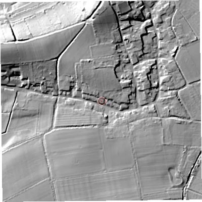 Shaded relief map of the ground around TA70PB, computed from Environment Agency LiDAR. The ground here sits at about 9 m above sea level and falls 23 m across the surrounding 800 m. Surface water reaching this point runs off ground lying to the north, 9.3 m higher.