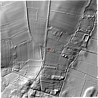 Shaded relief map of the ground around TA70QL, computed from Environment Agency LiDAR. The ground here sits at about 10 m above sea level and falls 10 m across the surrounding 800 m. Surface water reaching this point runs off ground lying to the west-north-west, 1.5 m higher.