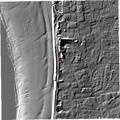 Shaded relief map of the ground around TA81DX, computed from Environment Agency LiDAR. The ground here sits at about 9 m above sea level and falls 17 m across the surrounding 800 m. Surface water reaching this point runs off ground lying to the north, 2.7 m higher.