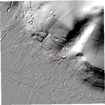 Shaded relief map of the ground around TA94DY, computed from Environment Agency LiDAR. The ground here sits at about 12 m above sea level and falls 128 m across the surrounding 800 m. Surface water reaching this point runs off ground lying to the north-east, 64.6 m higher.
