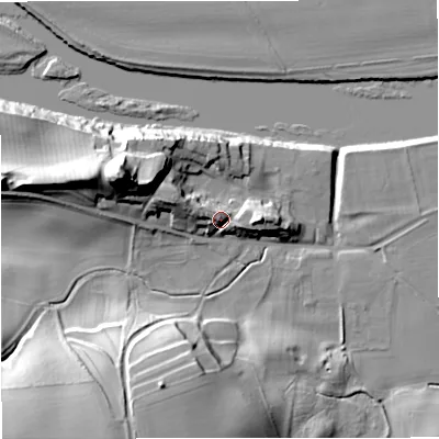Shaded relief map of the ground around TD124RE, computed from Environment Agency LiDAR. The ground here sits at about 29 m above sea level and falls 35 m across the surrounding 800 m. Surface water reaching this point runs off ground lying to the east, 7.5 m higher.